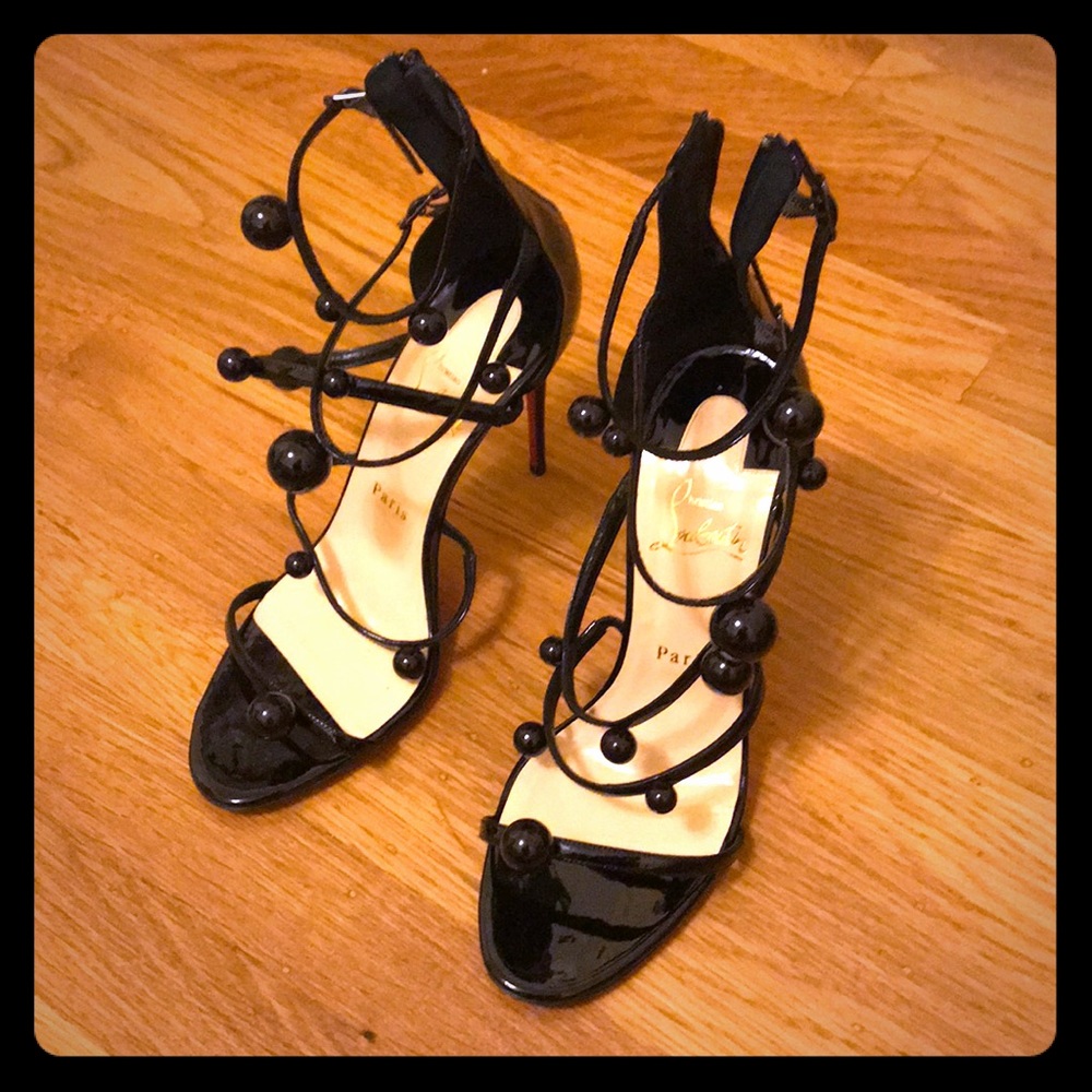 Sexiest Louboutin “Atonana” black stiletto sandals
